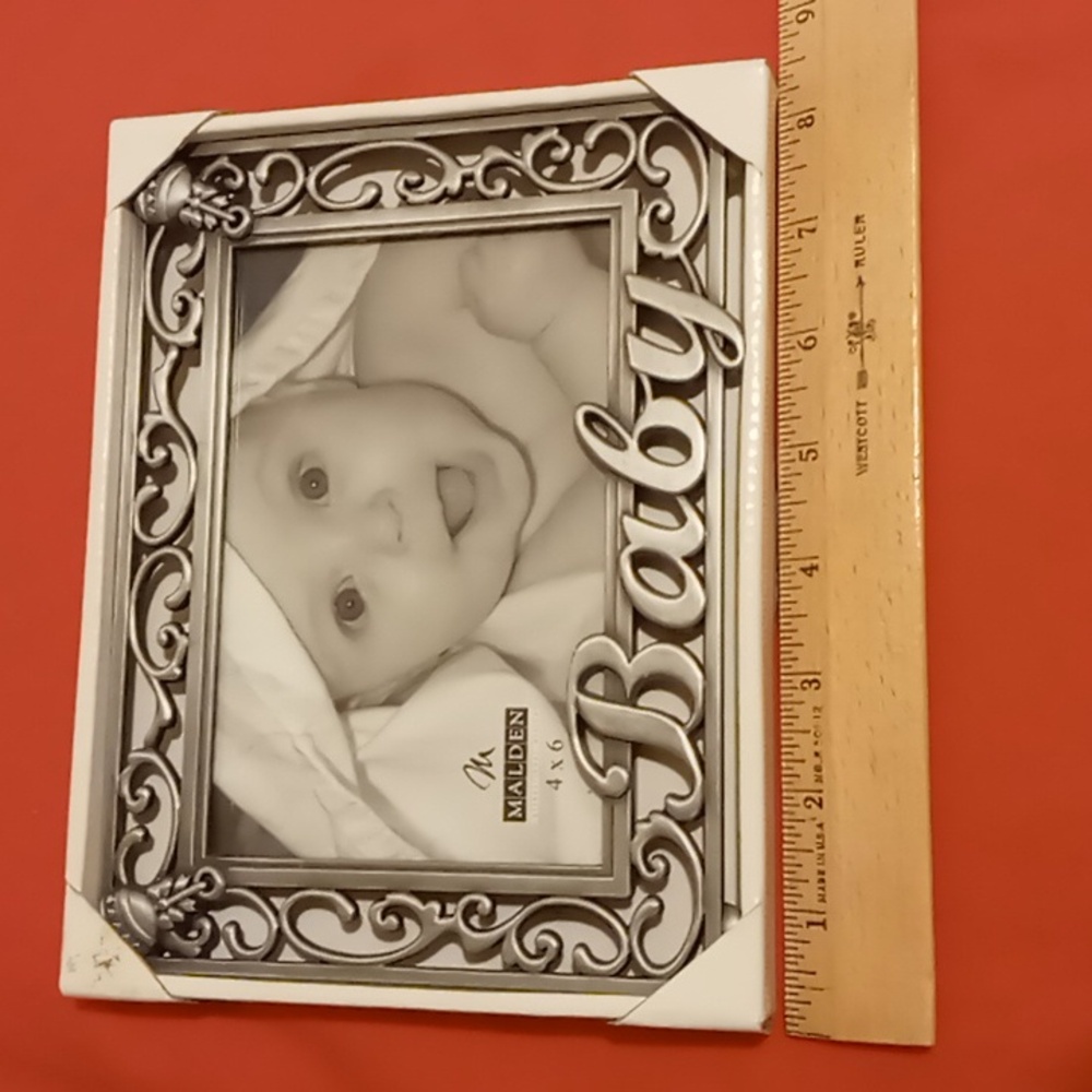 MALDEN DESIGN INTERNATIONAL BABY PHOTO FRAME.